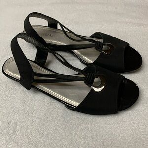Marbella sandal. Black. Size 8 1/2M. Very small heel. About 1 1/2 heel. Used.